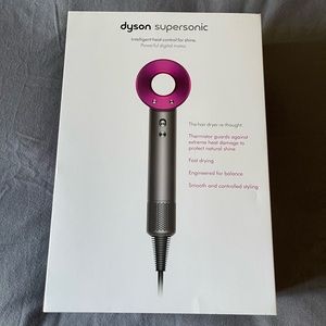 Dyson supersonic hairdryer in iron/fuschia